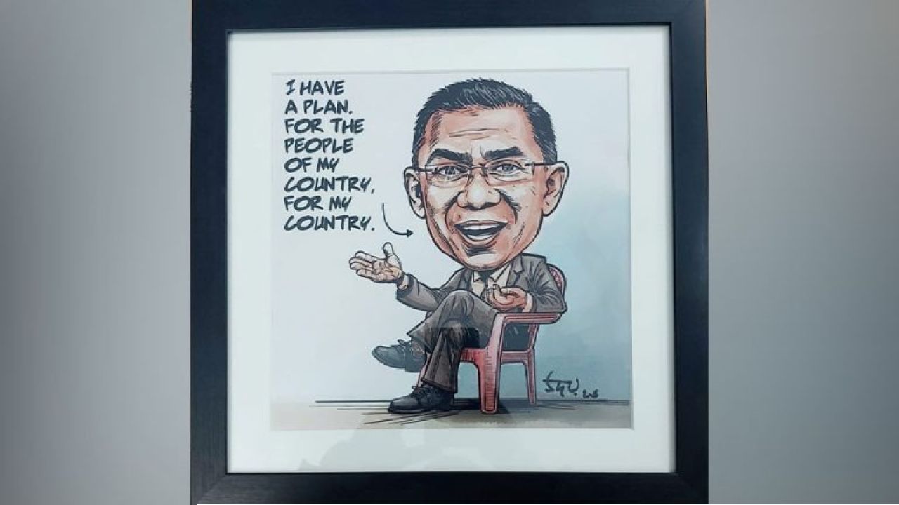 নিজের কার্টুন উপহার পেয়ে আনন্দিত তারেক রহমান